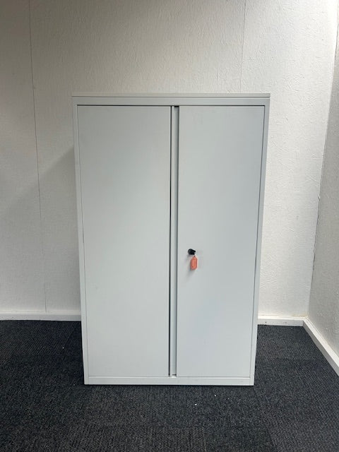 Metal double door cupboard with a white wood top