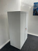 Metal double door cupboard with a white wood top